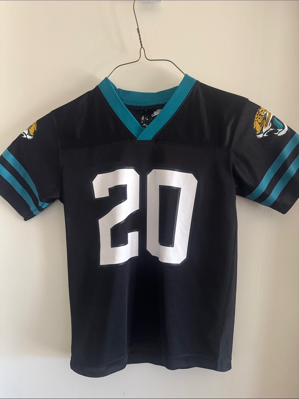 Jacksonville Jaguars NFL Youth Black Jersey with Teal Trim and White 20